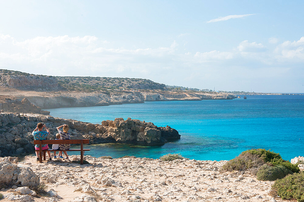 Family looking out over Cape Greco, Protaras, Cyprus, Mediterranean, Europe