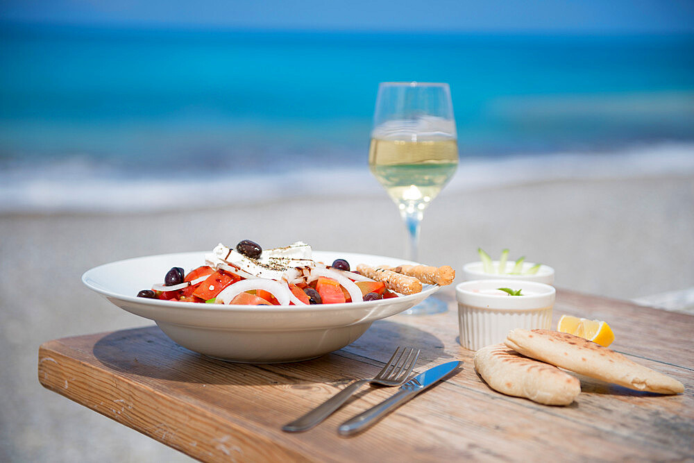 Cypriot Village Salad by the sea served with pitta bread and white wine, Cyprus, Mediterranean, Europe