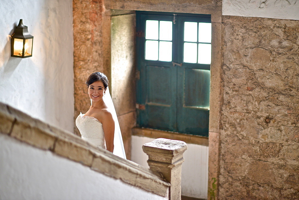 Hispanic bride getting ready on her wedding day