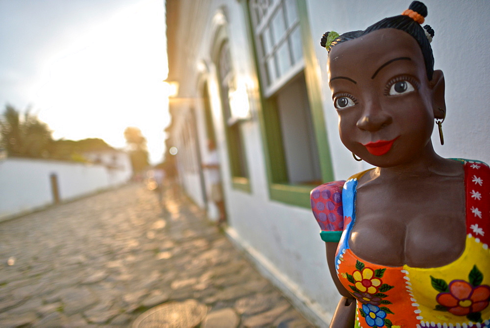 Afro-Brazilian Namoradeira statue in the Historic District of Paraty, Brazil