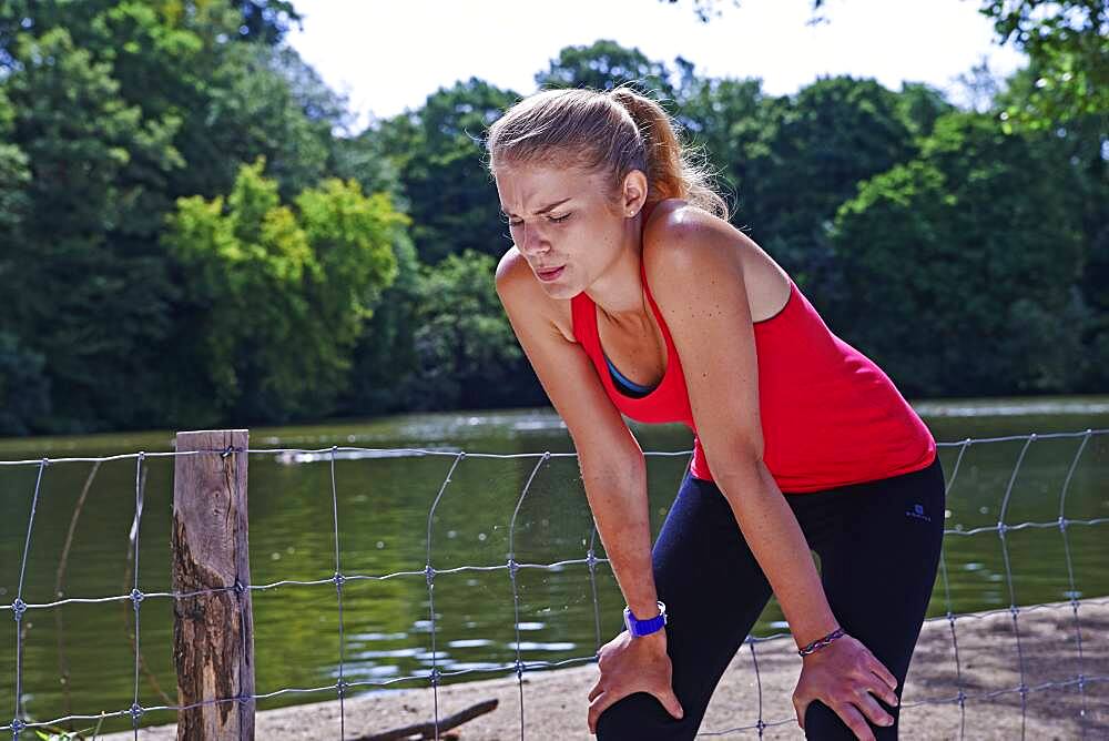 Woman resting after exercising.