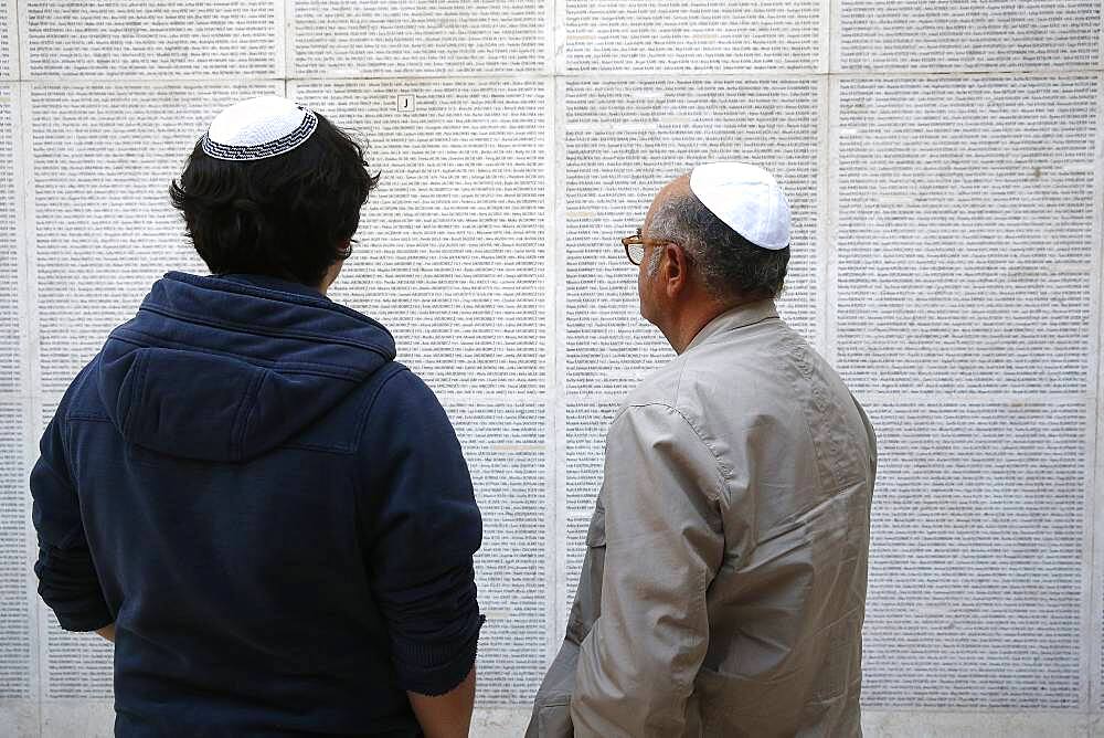 Wall of names at the Paris Holocaust memorial.