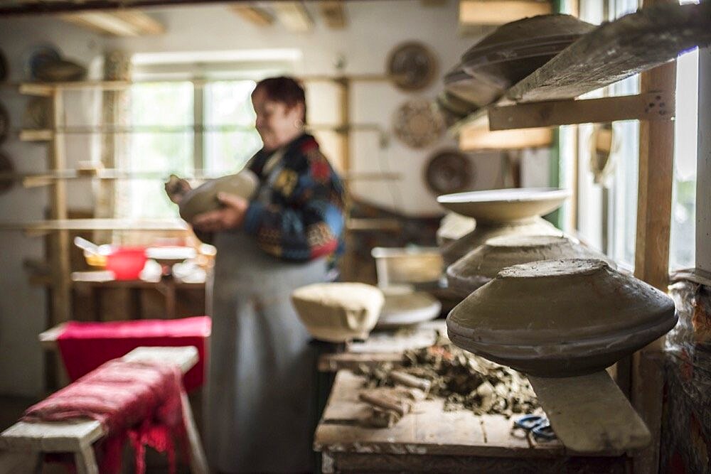 Woman making Horezu ceramics, a unique type of Romanian pottery, UNESCO Cultural Heritage List, Wallachia, Romania