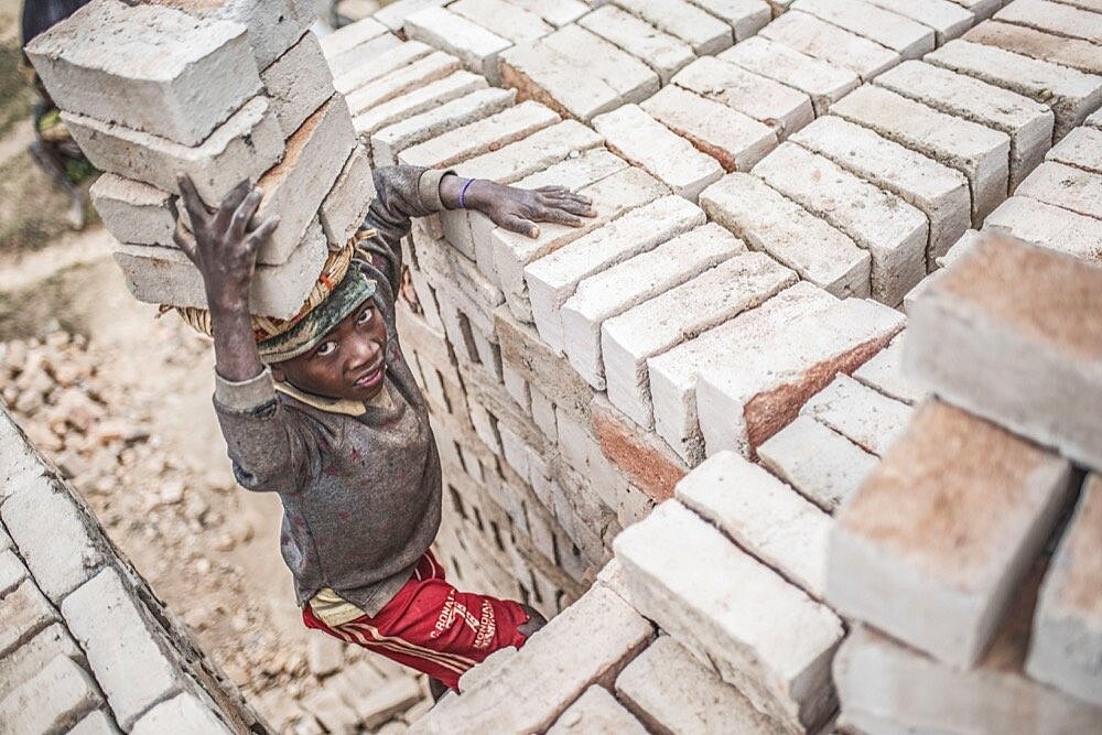 Brick workers near Ranomafana, Haute Matsiatra Region, Madagascar