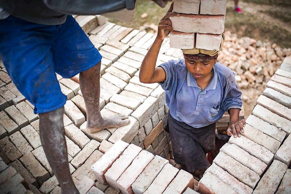 Brick workers near Ranomafana, Haute Matsiatra Region, Madagascar