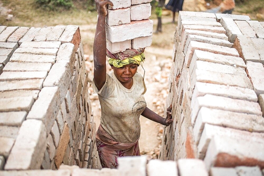 Brick workers near Ranomafana, Haute Matsiatra Region, Madagascar