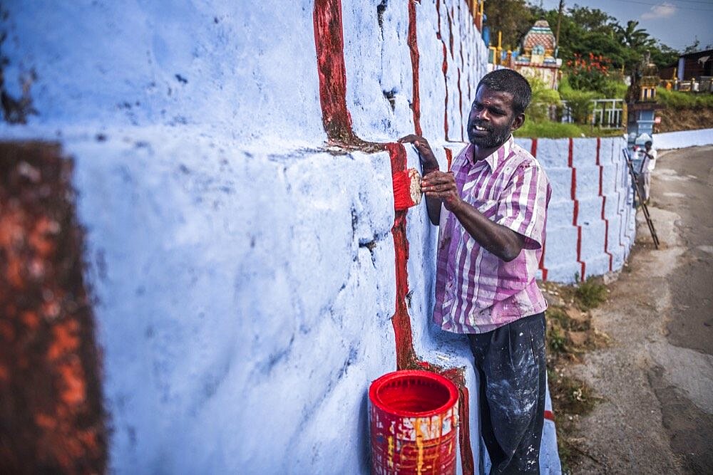 Repainting Sri Subramaniya Swamy Hindu Temple blue, Munnar, Western Ghats Mountains, Kerala, India