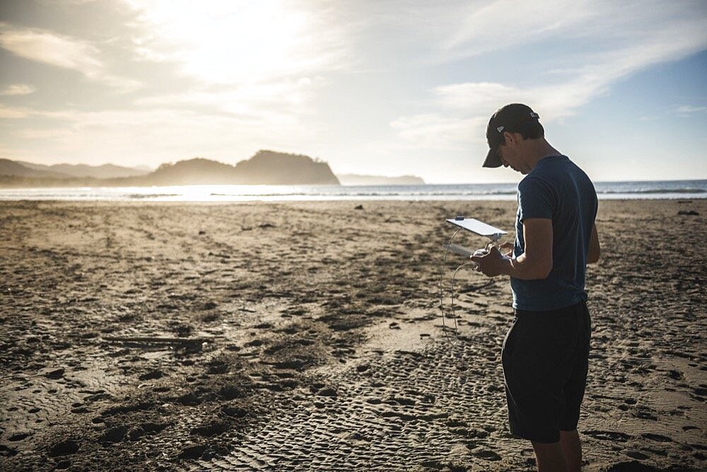 Flying a drone at Playa Buena Vista Beach at sunrise, Guanacaste Province, Costa Rica