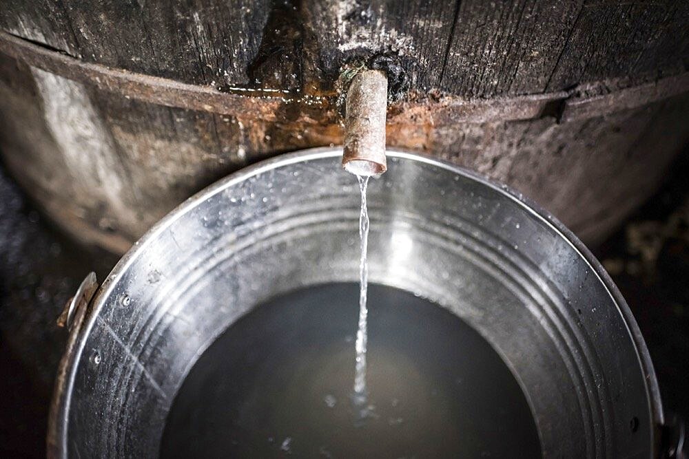 Distillery for making Palinka, a traditional Romanian fruit brandy, Sarbi, Maramures, Romania