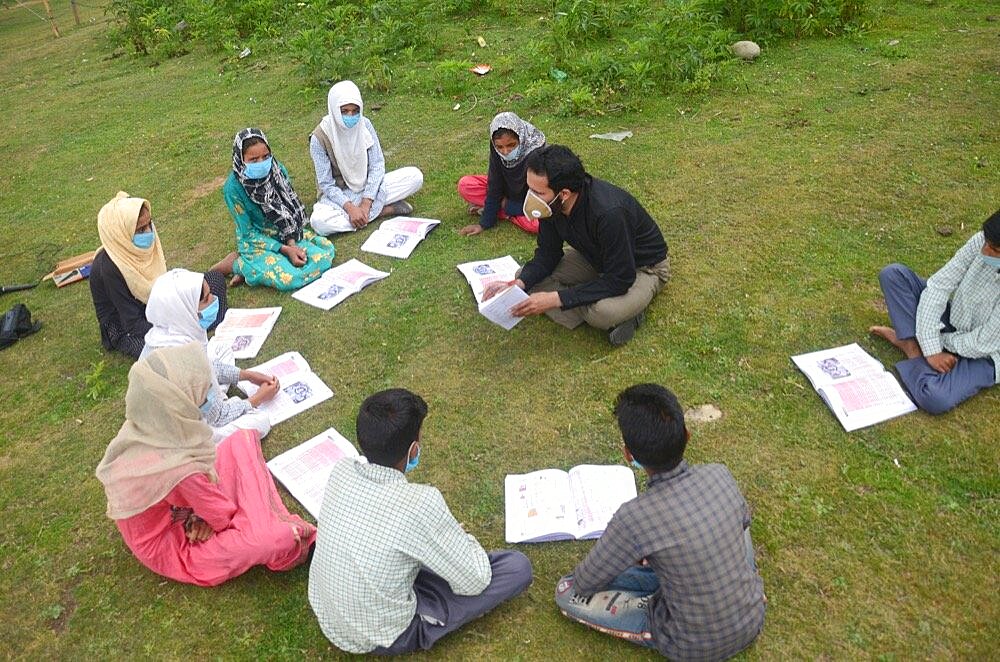 Students attending their open air classes at Doodhpathri in Budgam district, Kashmir, India.