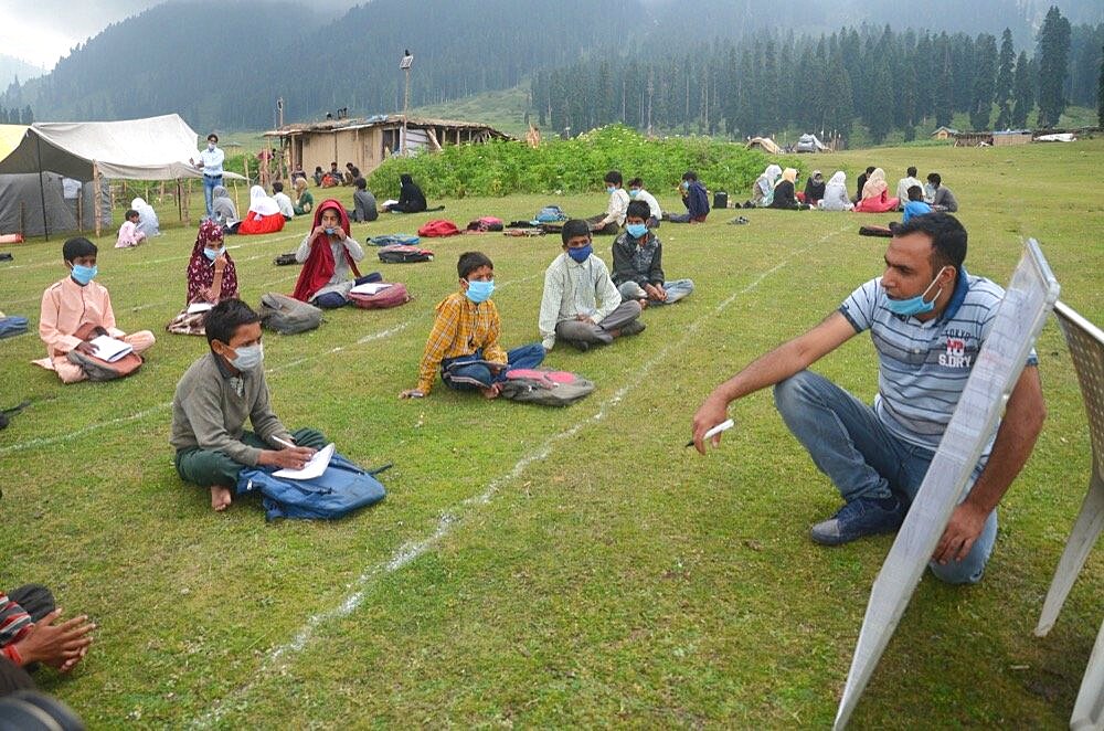 Students attending their open air classes at Doodhpathri in Budgam district, Kashmir, India.