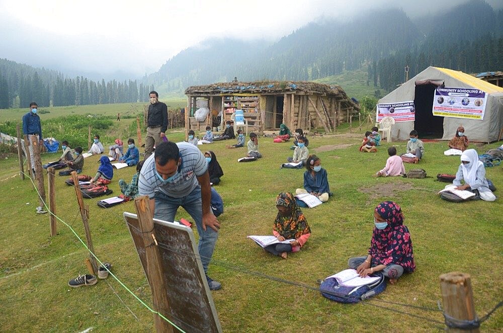 Students attending their open air classes at Doodhpathri in Budgam district, Kashmir, India.