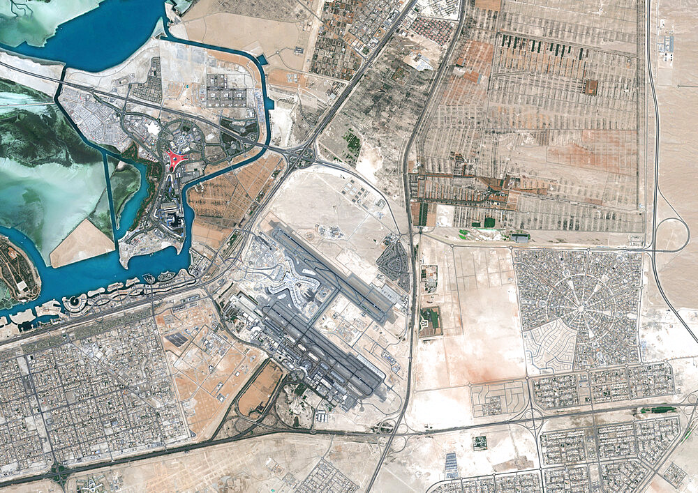 Color satellite image of Abu Dhabi International Airport, United Arab Emirates. The amusement park Ferrari World Abu Dhabi is on Yas Island, at center left on the image. Image collected on September 21, 2017 by Sentinel-2 satellites.