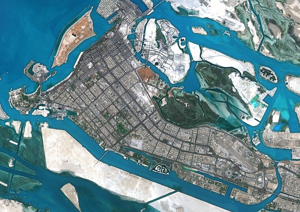 Color satellite image of Abu Dhabi, capital city of United Arab Emirates. The city is on an island connected by bridges to the mainland and other islands. Image collected on September 21, 2017 by Sentinel-2 satellites.