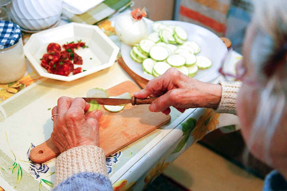 Senior in kitchen