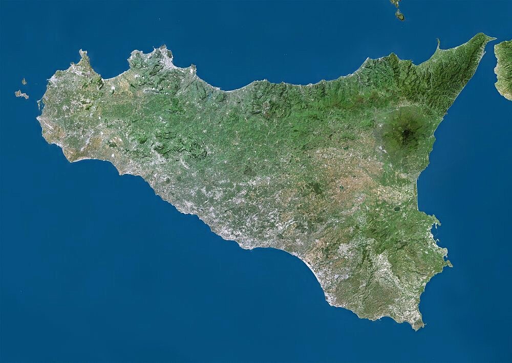 Satellite view of Sicily, Italy. Mount Etna, on the East coast of Sicily, is the largest active volcano in Europe. This image was compiled from data acquired by Landsat satellites.