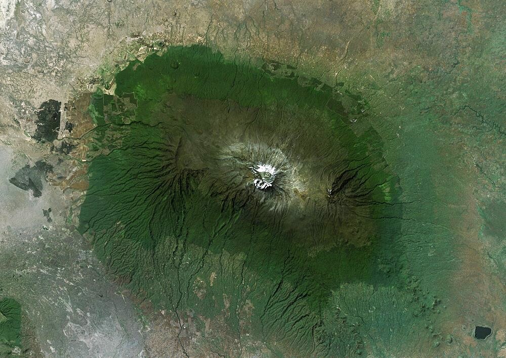 Satellite view of Mount Kilimanjaro, Tanzania. This dormant volcano is the highest mountain in Africa. It is part of the Kilimanjaro National Park. This image was compiled from data acquired by Landsat satellites.