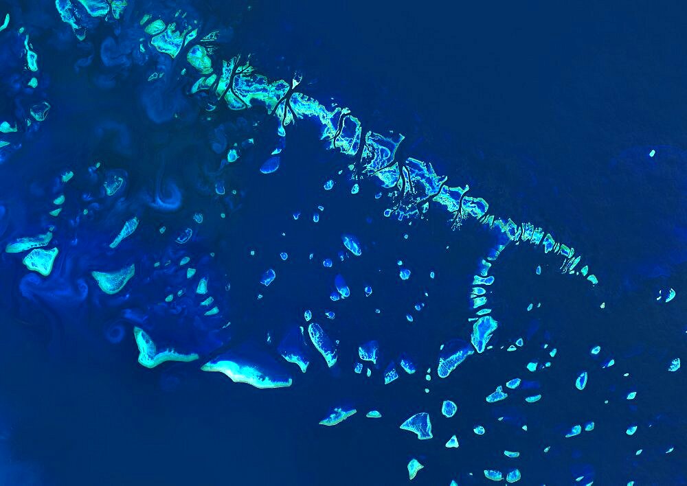 Satellite view of the Great Barrier Reef, Australia, off Mackay's coast. This image was compiled from data acquired in 2014 by Landsat 8 satellite.