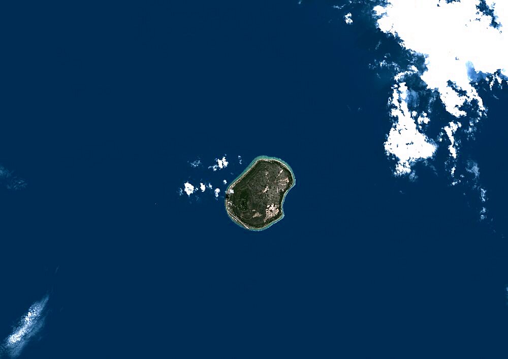 Nauru, True Colour Satellite Image. Nauru. True colour satellite image of Nauru, an island nation in Micronesia in the South Pacific. This image was taken on 29 June 1999, by the LANDSAT 7 satellite.