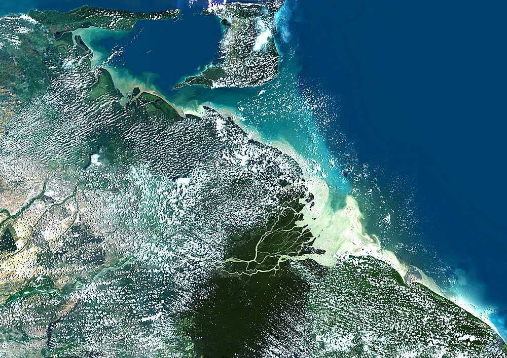 Orinoco Delta, Venezuela, True Colour Satellite Image. True colour satellite image of the Orinoco Delta in eastern Venezuela, The Orinoco river flows into the Atlantic ocean. At top is the island of Trinidad in the Caribbean sea. Composite image using LANDSAT 5 data.