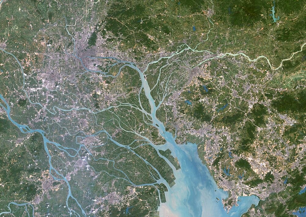 Canton And Shenzen, China, In 2000, True Colour Satellite Image. True colour satellite image of the cities of Guangzhou (Canton) and Shenzen, China. Image in landscape format, taken on 14 September 2000, using LANDSAT data.