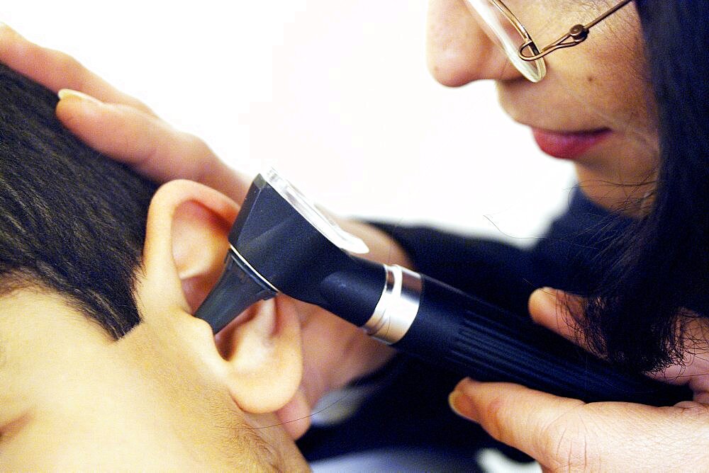 Pediatrician examining Child