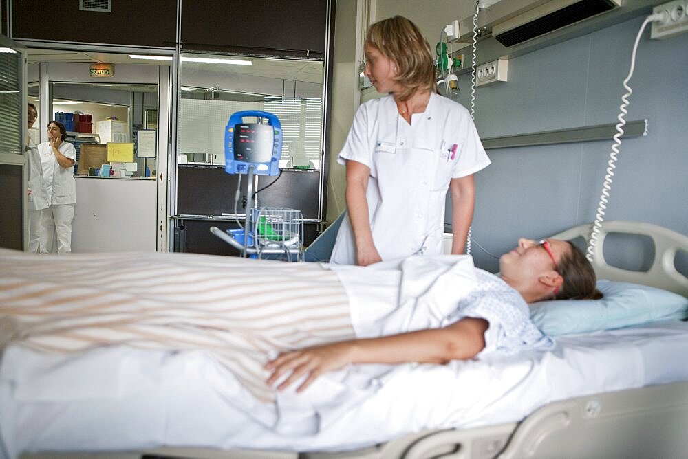 Nurse Taking Patient's Blood Pressure