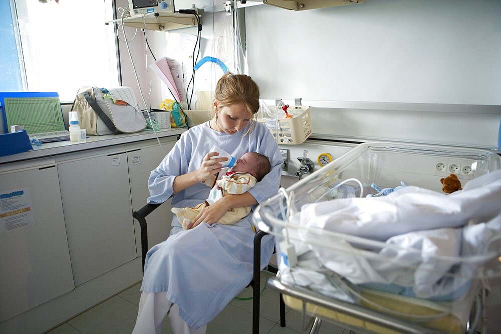 Nurse Bottle Feeding Premature Baby