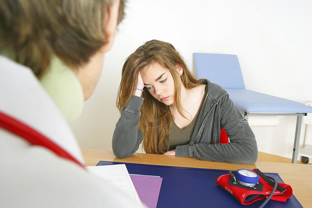 Teenage girl in doctor's surgery