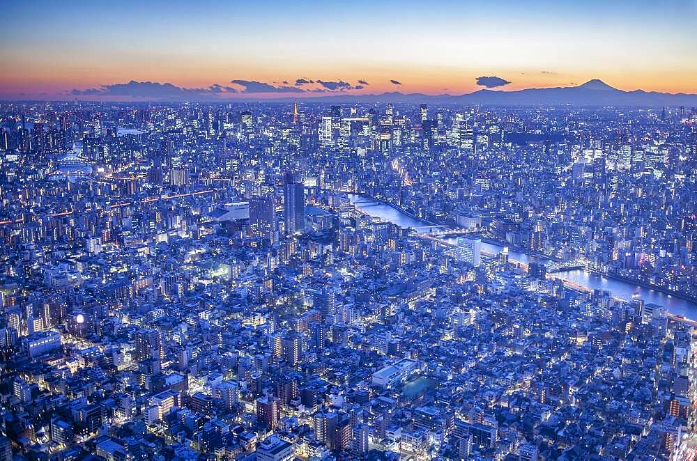 Skyline, Sumidagawa river and in background at right Mount Fuji, Tokyo, Japan