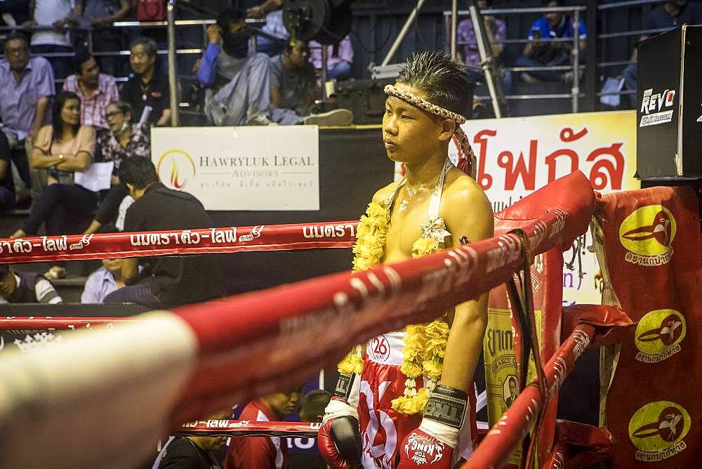 Presentation of the fight. Muay Thai fighter going through pre-fight ritual, Bangkok, Thailand