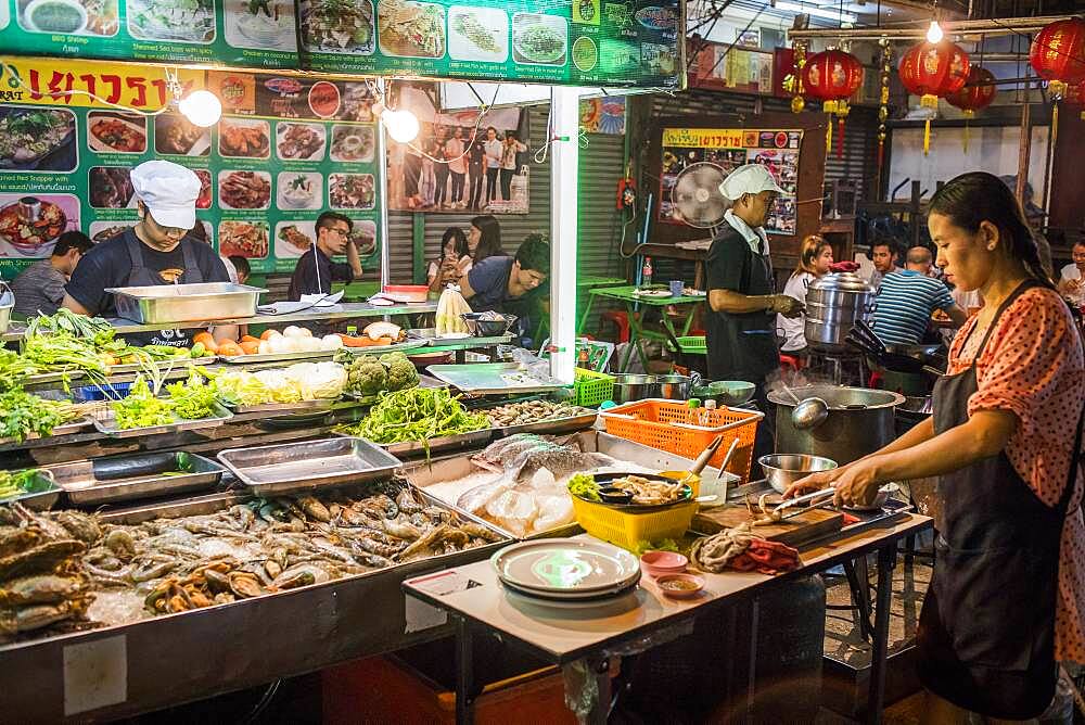 Restaurant, street food night market, at Itsara nuphap, Chinatown, Bangkok, Thailand