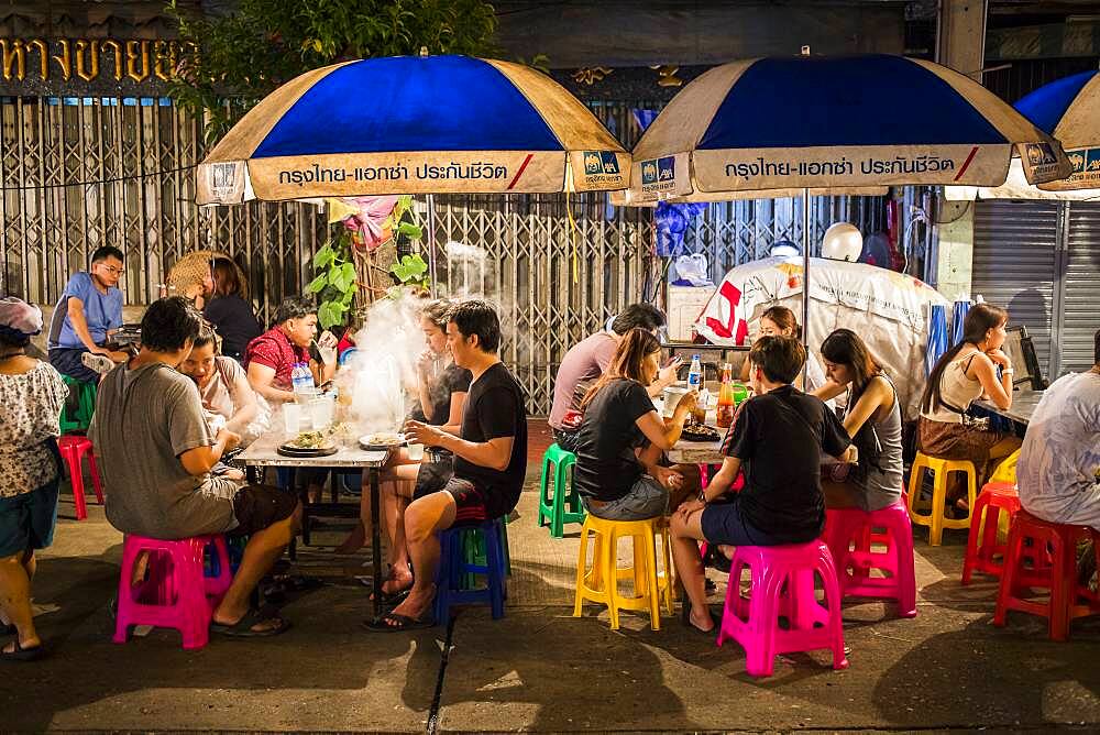 Restaurant, street food night market, at Itsara nuphap, Chinatown, Bangkok, Thailand