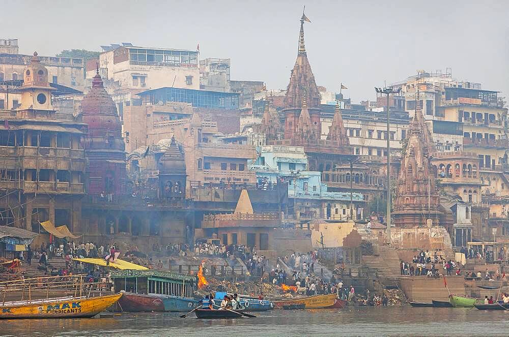 Manikarnika Ghat, the burning ghat, on the banks of Ganges river, Varanasi, Uttar Pradesh, India.