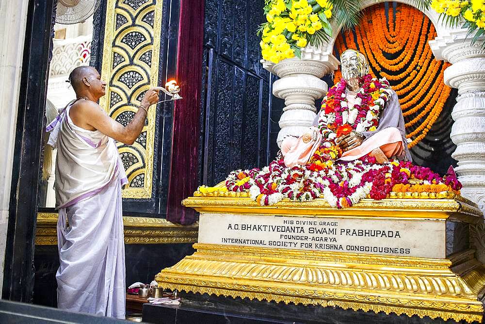 Praying, statue of A. C. Bhakivedanta Swami Prabhupada the founder of hare Krishna movement, in  ISKCON temple, Sri Krishna Balaram Mandir,Vrindavan,Mathura, Uttar Pradesh, India