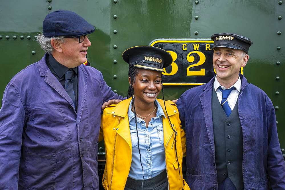 Tourist and workers, firemen, Llanfair and Welshpool Steam Railway, Wales