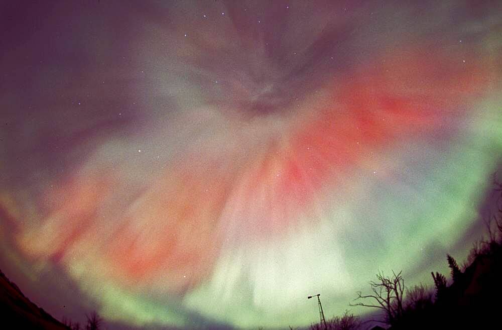 April 17/18, 2001 aurora, taken from home in Alberta. looking south. Part of a series taken looking same direction as substorm hit and subsided, from Image #2 to #15, on Roll #1. (Roll #2 was second camera shooting Provia 100F with 28mm lens and 18mm lens.) All images in this series (#1-02 thru 15) processed in Photoshop with nearly identical enhancements to contrast and colour. Brightness toned down for longer overexposed shots (early ones).