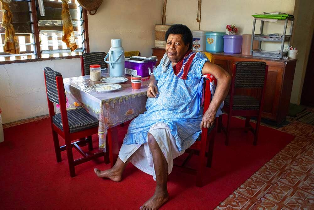 Old Woman inside a house in Solevu island and Yaro island in Malolo Island Mamanucas island group Fiji