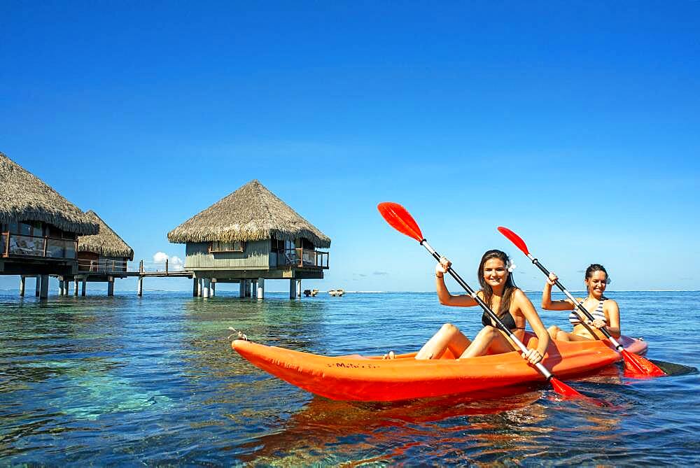 Kayaking in front Le Meridien Hotel on the island of Tahiti, French Polynesia, Tahiti Nui, Society Islands, French Polynesia, South Pacific.