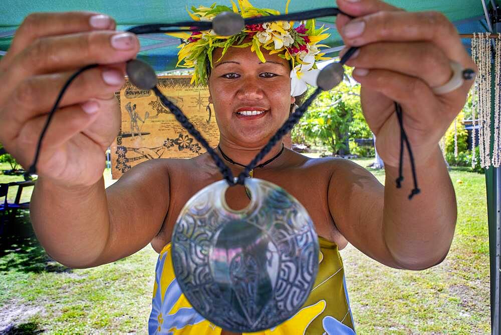 Local woman selling crafs in Fakarava, Tuamotus Archipelago French Polynesia, Tuamotu Islands, South Pacific.