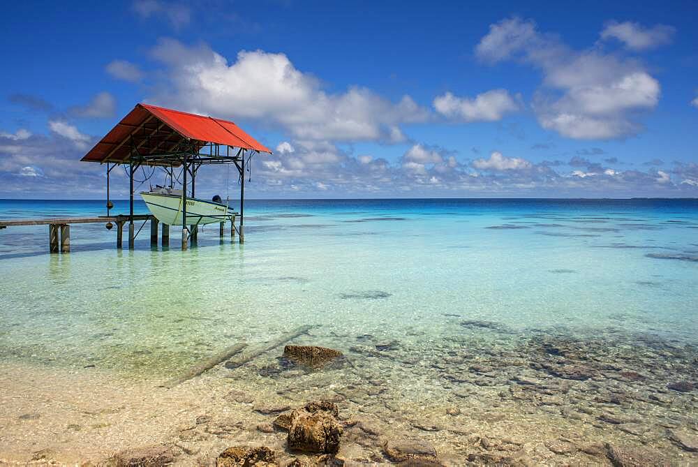 Small pier and boat in Fakarava, Tuamotus Archipelago French Polynesia, Tuamotu Islands, South Pacific.