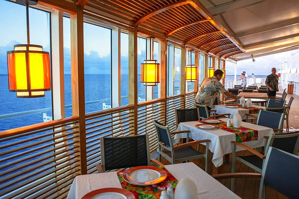 Restaurant in the luxury Paul Gauguin cruise, Society Islands, Tuamotus Archipelago, French Polynesia, South Pacific.