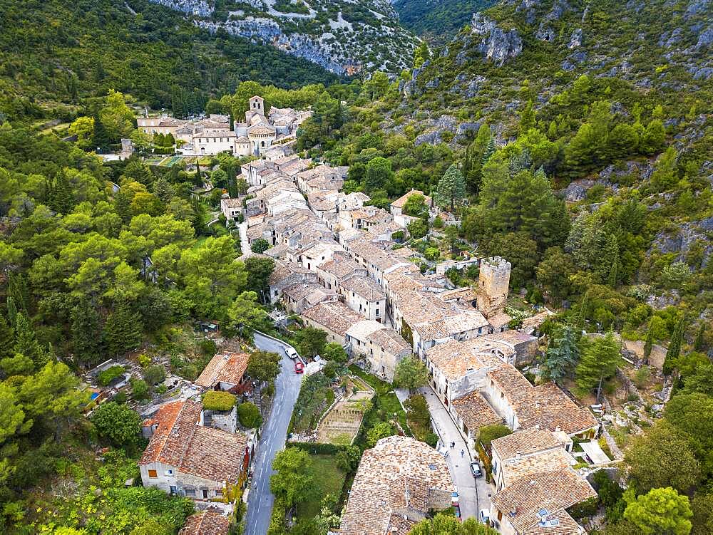 Aerial view Saint Guilhem le Desert, labelled Les Plus Beaux Villages de France (The Most Beautiful Villages of France), a stop on el Camino de Santiago, Herault, France.