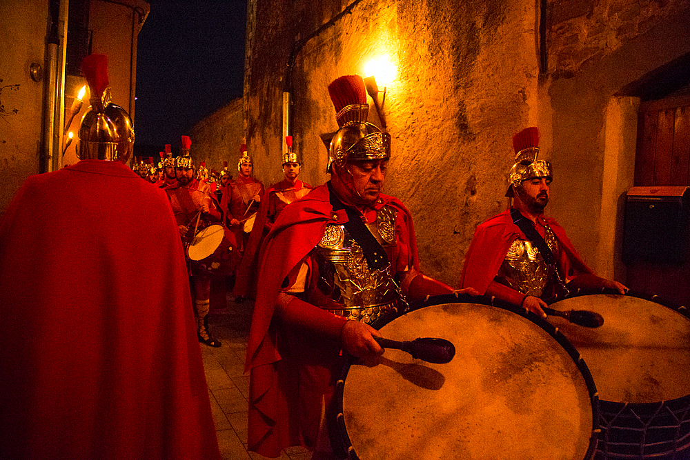 Verges, a small town in the Northeast of Catalonia (Spain), during Easter celebrates the Procession of Verges with skeletons dancing on the sound of a drum, Roman soldiers, known as the 'Manages', and a representation of the life and crucifixion of Jesus Christ. The Procession features the Dance of Death, a tradition from the Middle Age associated with epidemics and plagues and the only one remaining in Spain Ten skeletons dance to the beat of a drum to remember that no one is exempt of death. The backdrop of the medieval walls and towers of Verges is key to this macabre staging.