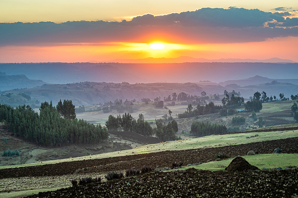 The sun setting over the mountains and valleys of Debre Berhan, Ethiopia.