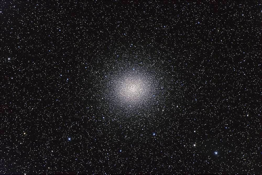 Omega Centauri globular cluster, with Canon 20Da camera with 4-inch Astro-Physics Traveler apo refractor at f/6 for 4 minutes each at ISO800. Stack of 4 exposures, averaged stacked. Plus short 2-minute exposure for core area. Taken from Queensland, Australia, July 2006.