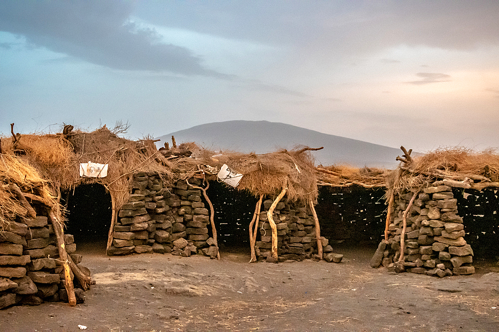 Primitively constructed huts near Erta Ale Volcano, a continuously active basaltic shield volcano and lava lake in the Afar Region of Ethiopia