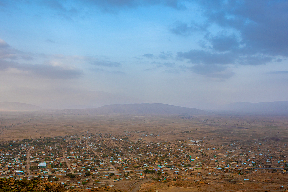 A town nestled below the mountains throughout the Danakil Depression, Ethiopia