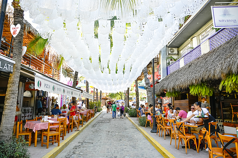 Sidewalk restaurants in Sayulita, Riviera Nayarit, Mexico.