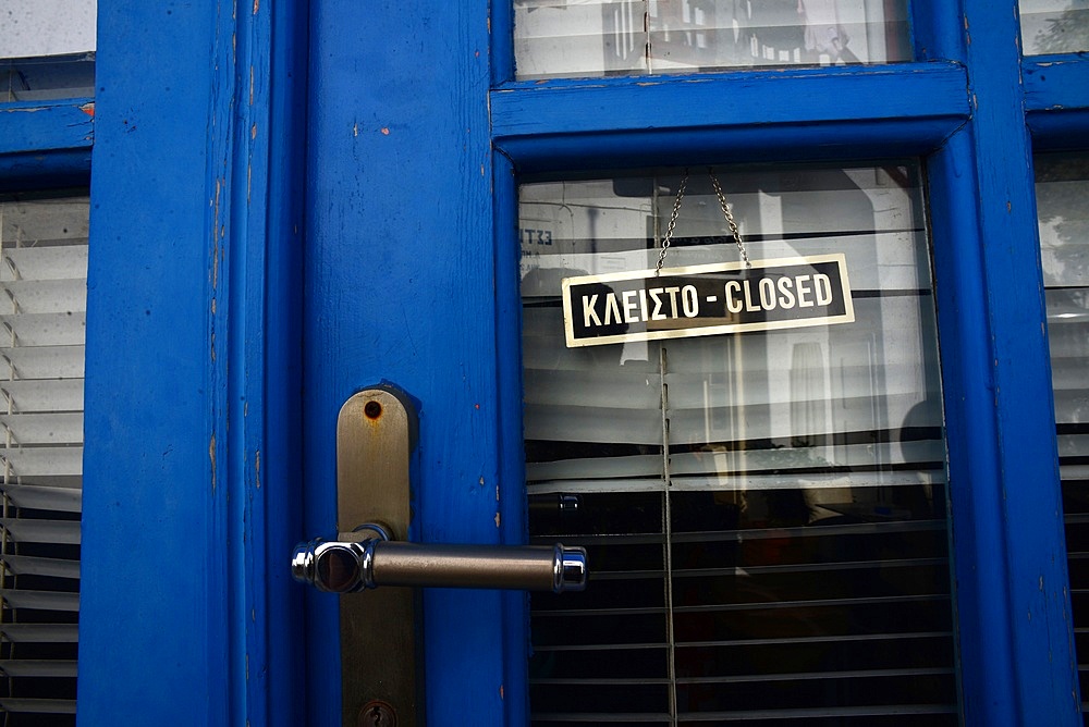 Closed sign in door, Mykonos, Greece